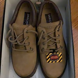 Skechers never worn. New in box. Size 7.